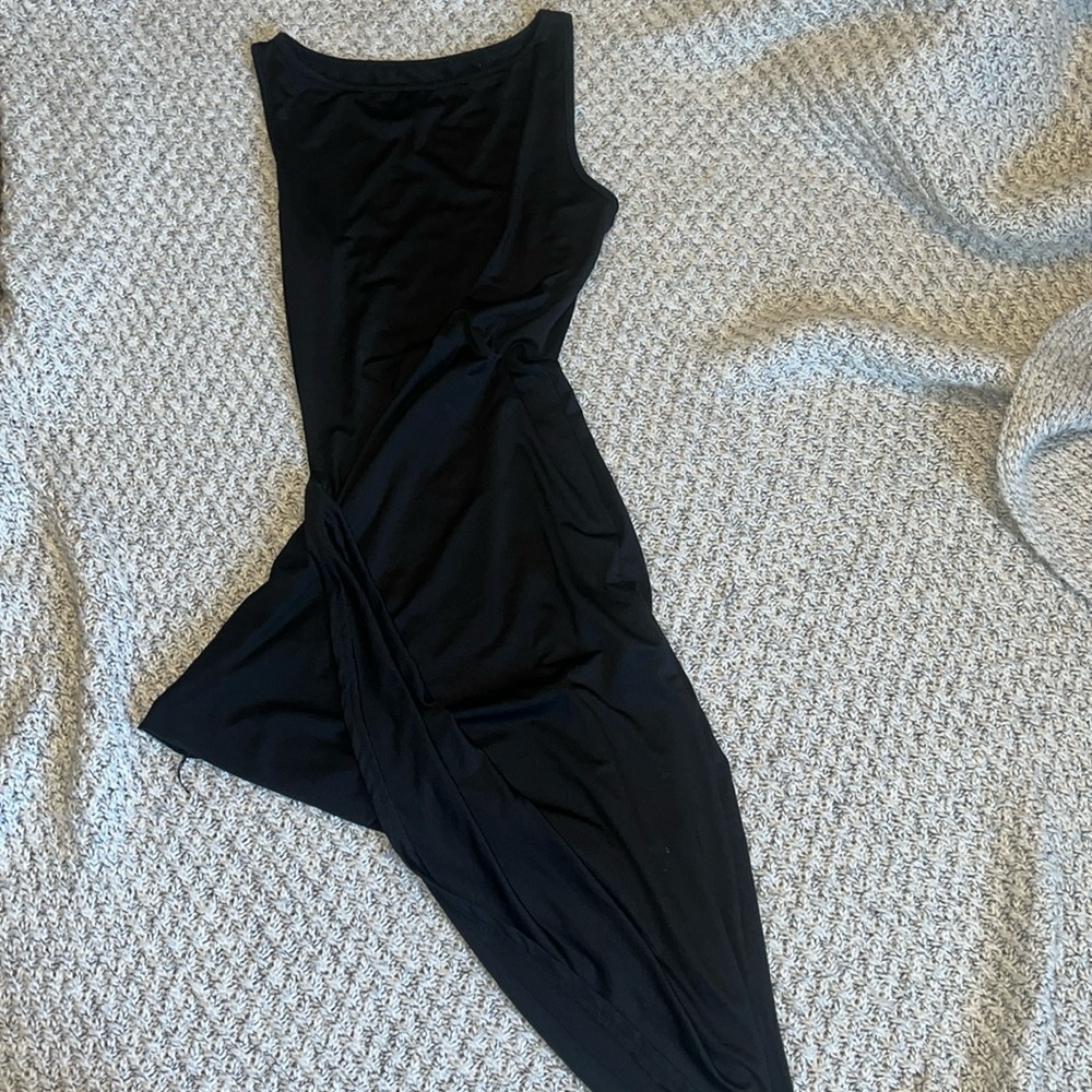 Black dress with asymmetrical length in size extra small